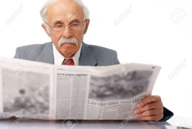 man-reading-newspaper